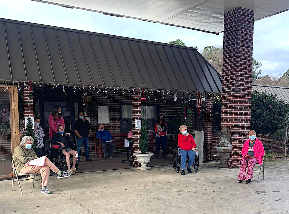 Collinsville Nursing Home residents visited by student carolers